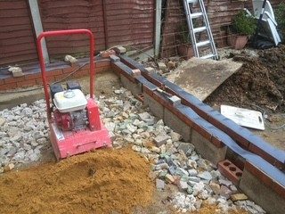Footings and DPC: Blockwork brought up to damp-proof course, sub-base compacted.