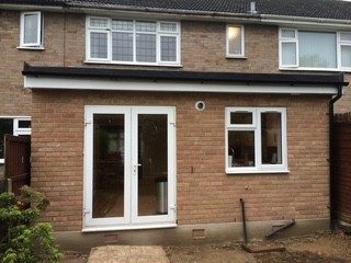 External finish: Roof finished, windows and French doors fitted.