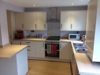 Kitchen fitted: Units, worktops and appliances installed in the new space.