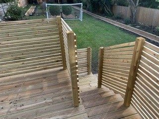 Slatted fence and deck steps